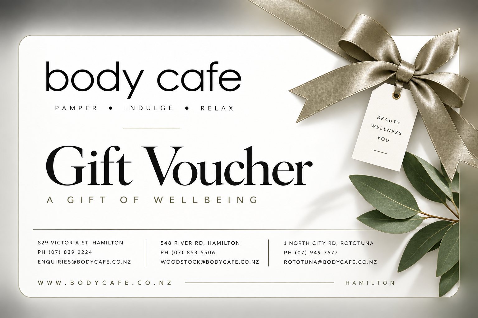 Body Cafe gift voucher with a satin ribbon and a gift tag